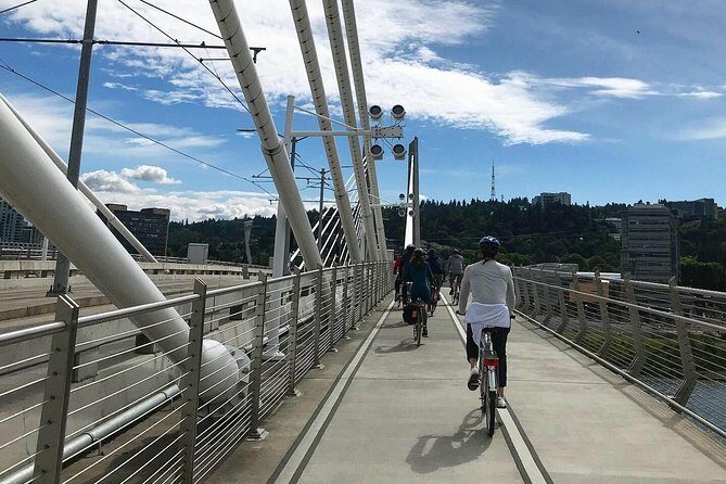 Bike Around Portland Oregon: Art, Culture, Bridges, Poetry - Solterra Building and MAX Orange Line art: wordplay to murals