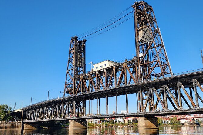 Portland's Ultimate 12 Historic Bridges' Scenic Boat Tour - Portland sign, maritime relics, and river-city details